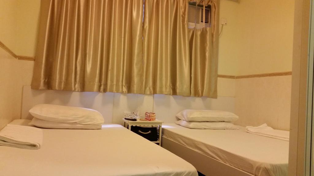 Li Cheng Guesthouse Hongkong Zimmer foto